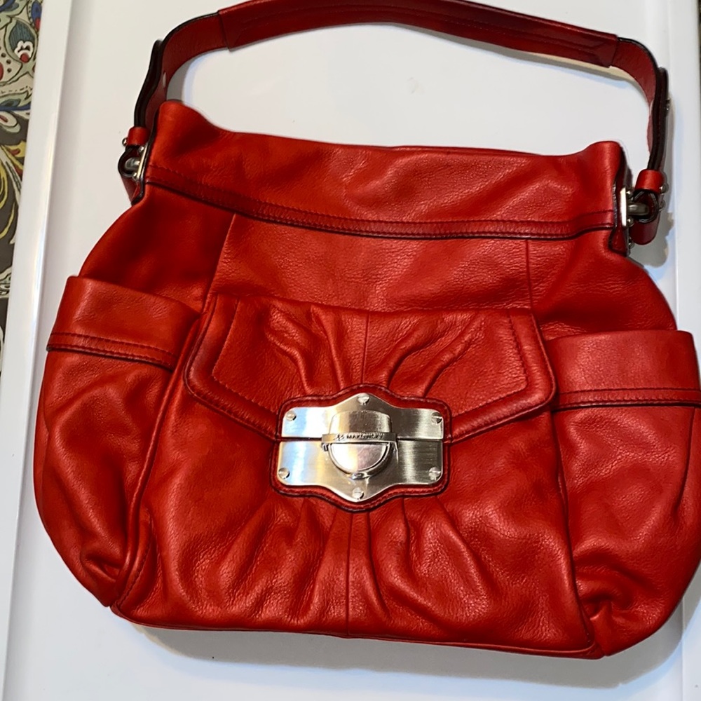 Markowsky red leather purse, 10x11x3.5.  Great condition. Strap 17”